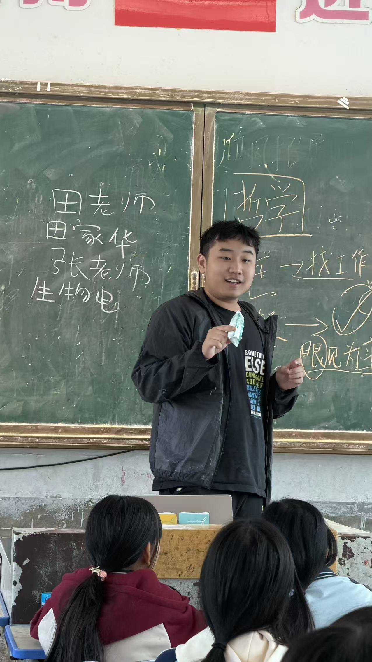 Chris teaching a philosophy lesson in a classroom